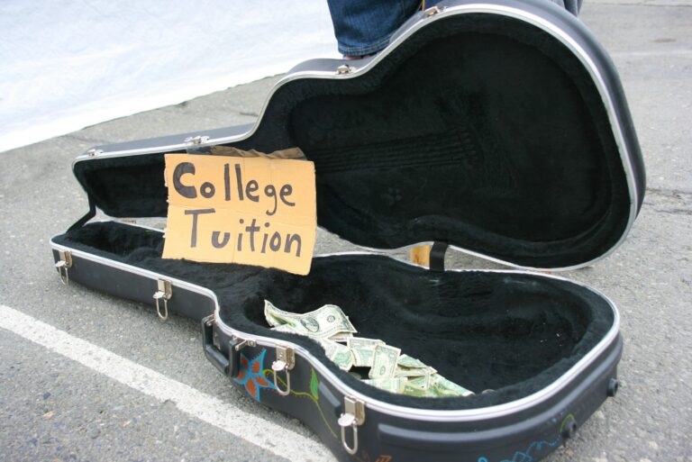 Open Guitar Case College Tuition Sign